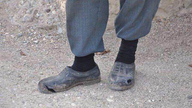 Madenci babasının yırtık ayakkabısı dikkat çekti Madenci babasının yırtık ayakkabısı dikkat çekti